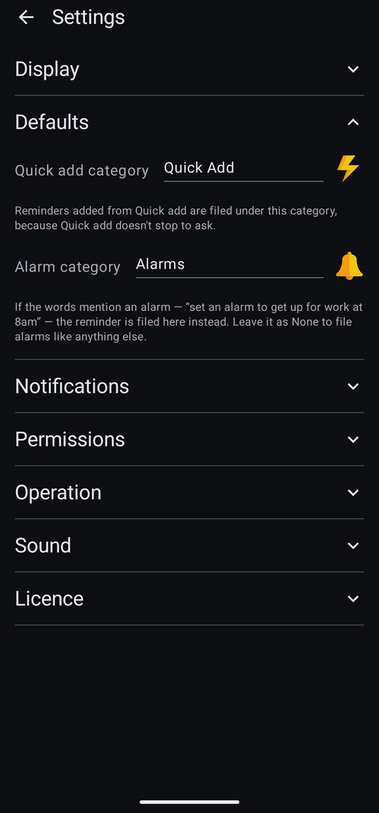 The Defaults section of Settings, showing Quick add category set to Quick Add and Alarm category set to Alarms, each with an explanation.